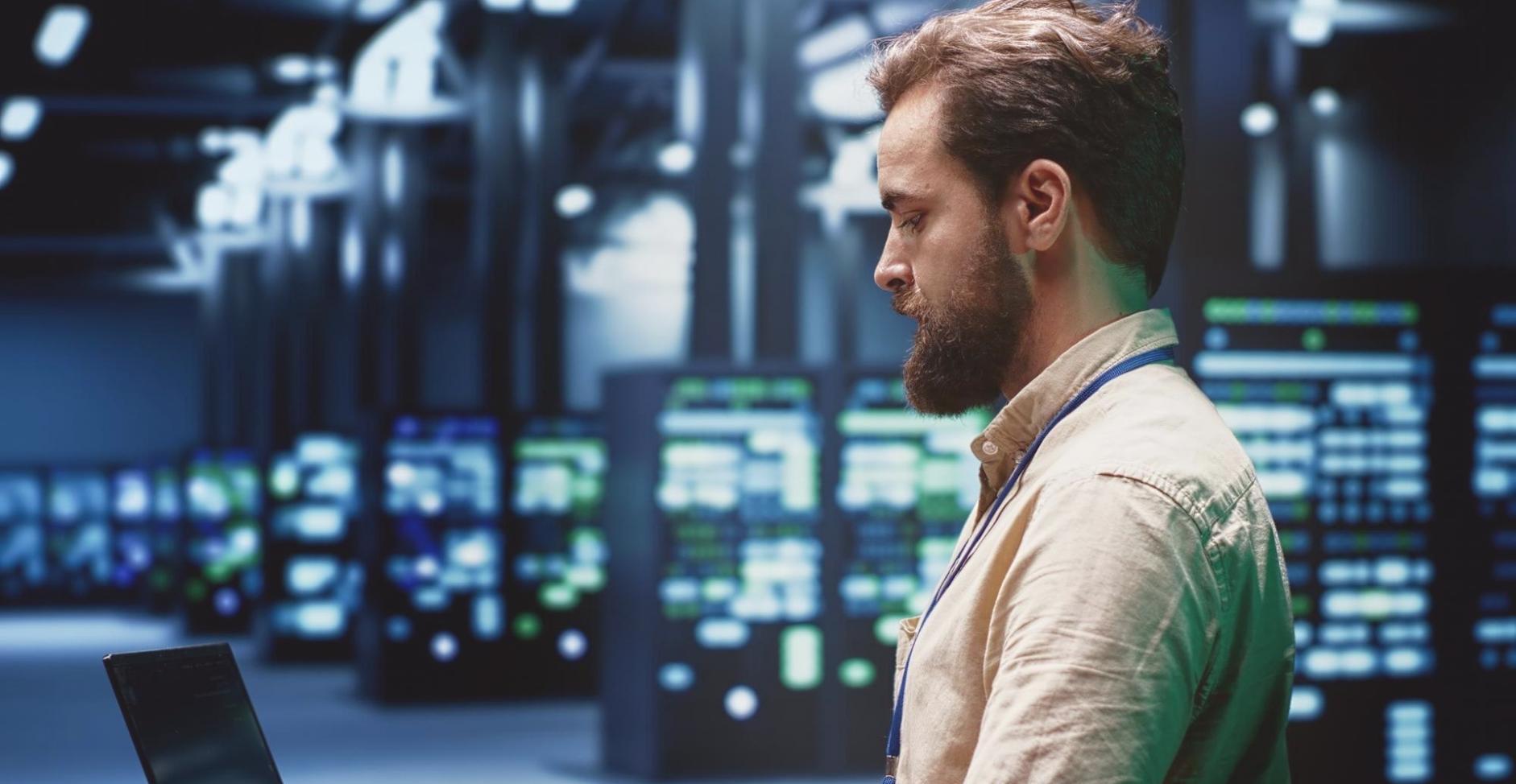 Students collaborating on game development projects in a modern coding environment, showcasing practical learning in JavaScript and HTML5 game programming